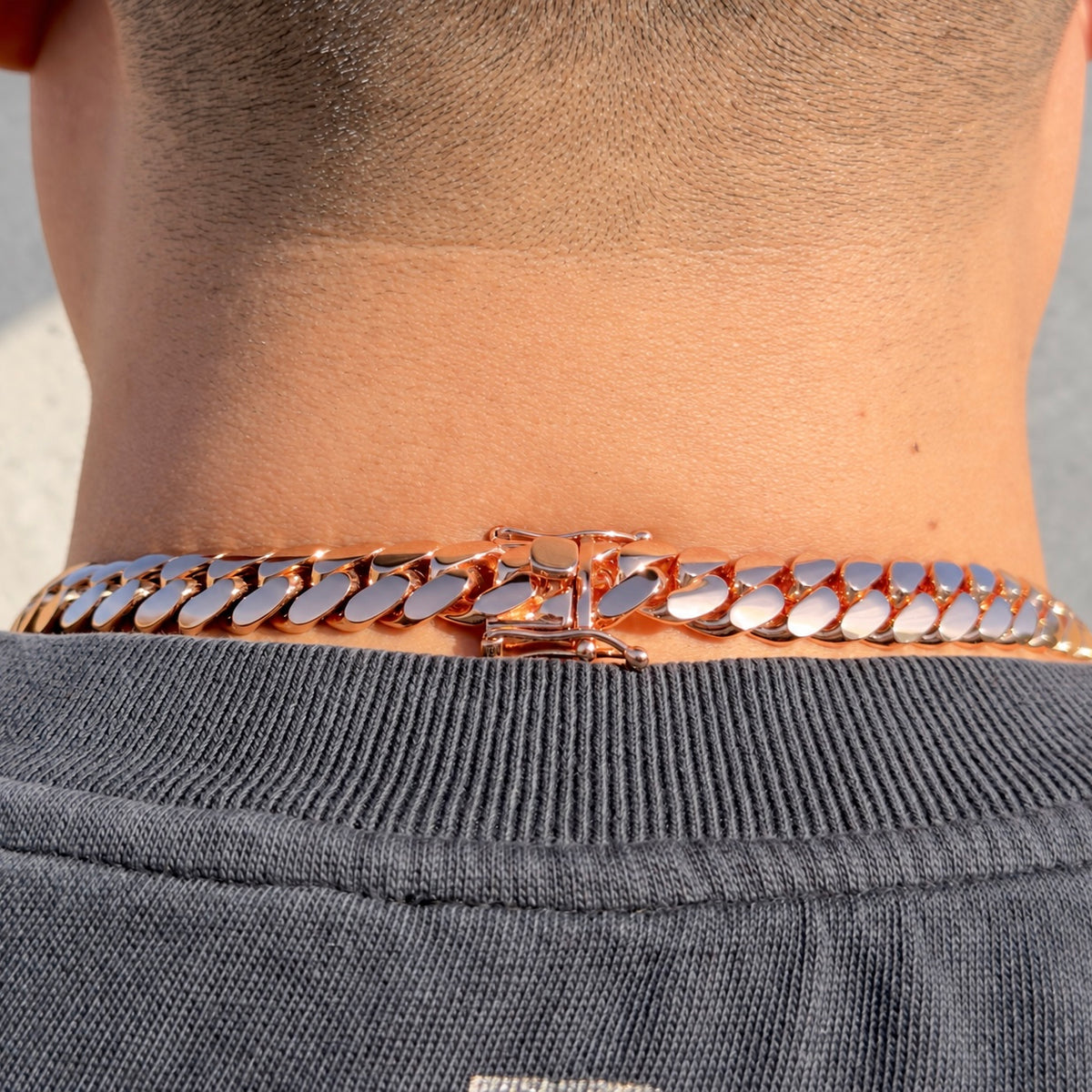 12mm rose gold Miami Cuban link chain clasp close-up worn on neck