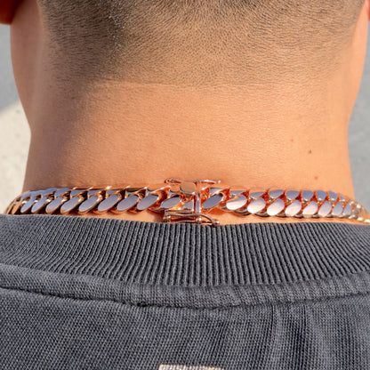 12mm rose gold Miami Cuban link chain clasp close-up worn on neck