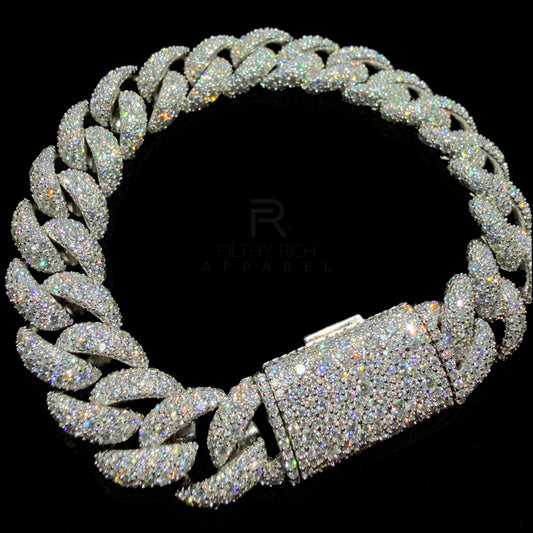 Galaxy Setting Moissanite Cuban Link Bracelet with fully iced mosaic-set links and box clasp on black background